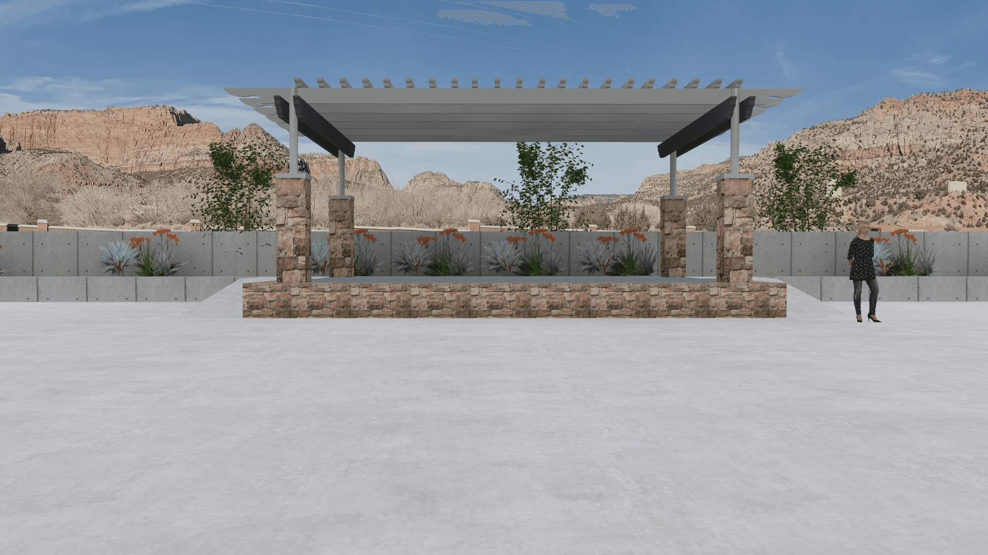 Outdoor stage and shade pavilion with red-rock backdrop