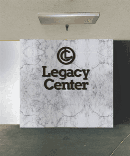 Legacy Center marble monogram signage in the lobby